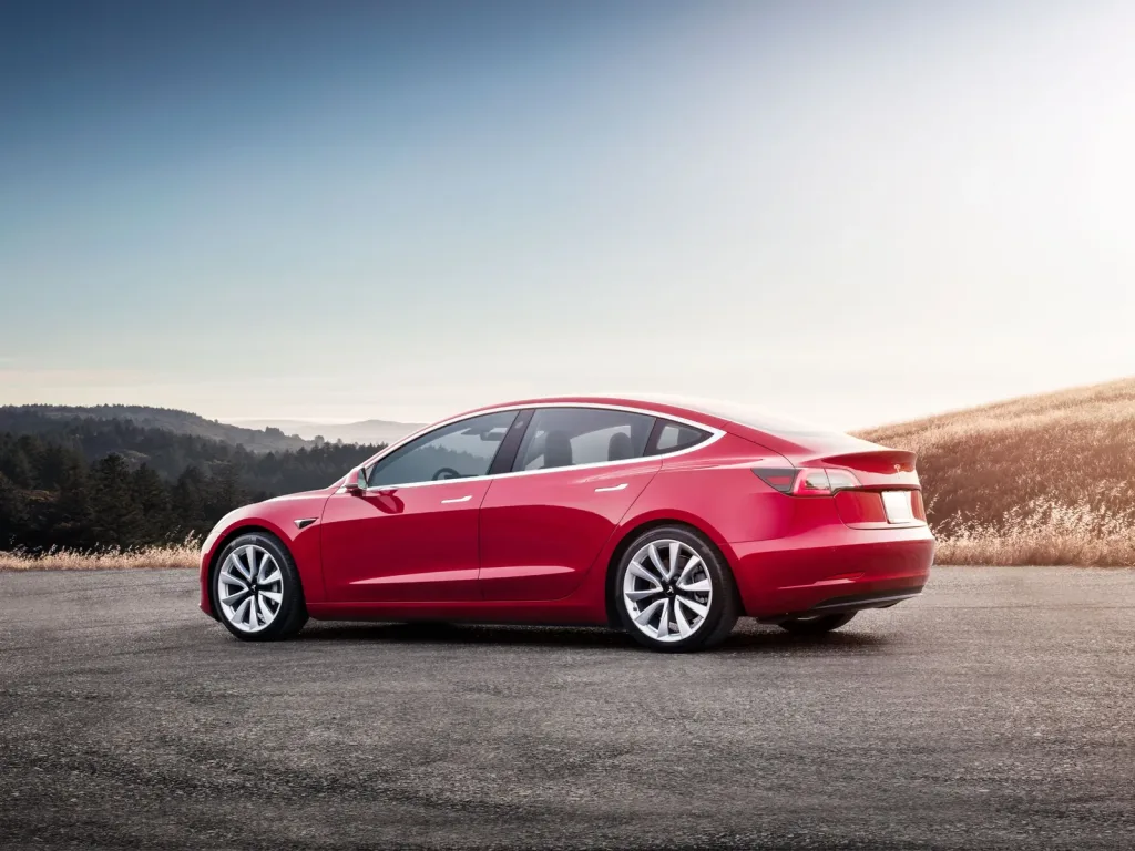 Model 3 Red Rear Sunset Can Tesla Compete in Indian EV Market?