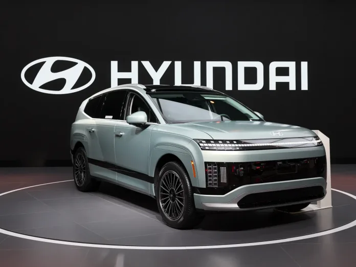 Hyundai India plans 6 new EVs by 2030 with 600 charging stations, aiming for a 13% market share through local production & strong nationwide EV infrastructure.