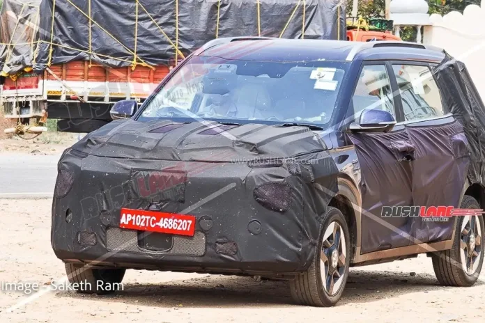 Kia's new 7-seater electric car has been spotted, offering a spacious and eco-friendly option for families. Learn about features, launch details, and more.