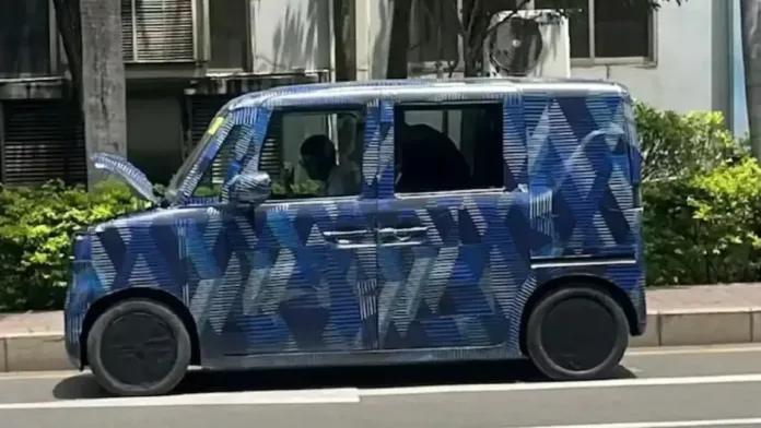 BYD's first mini EV Kei car spotted testing with sliding doors, 180 km range, and compact size—set to disrupt urban mobility and rival Japanese mini cars.